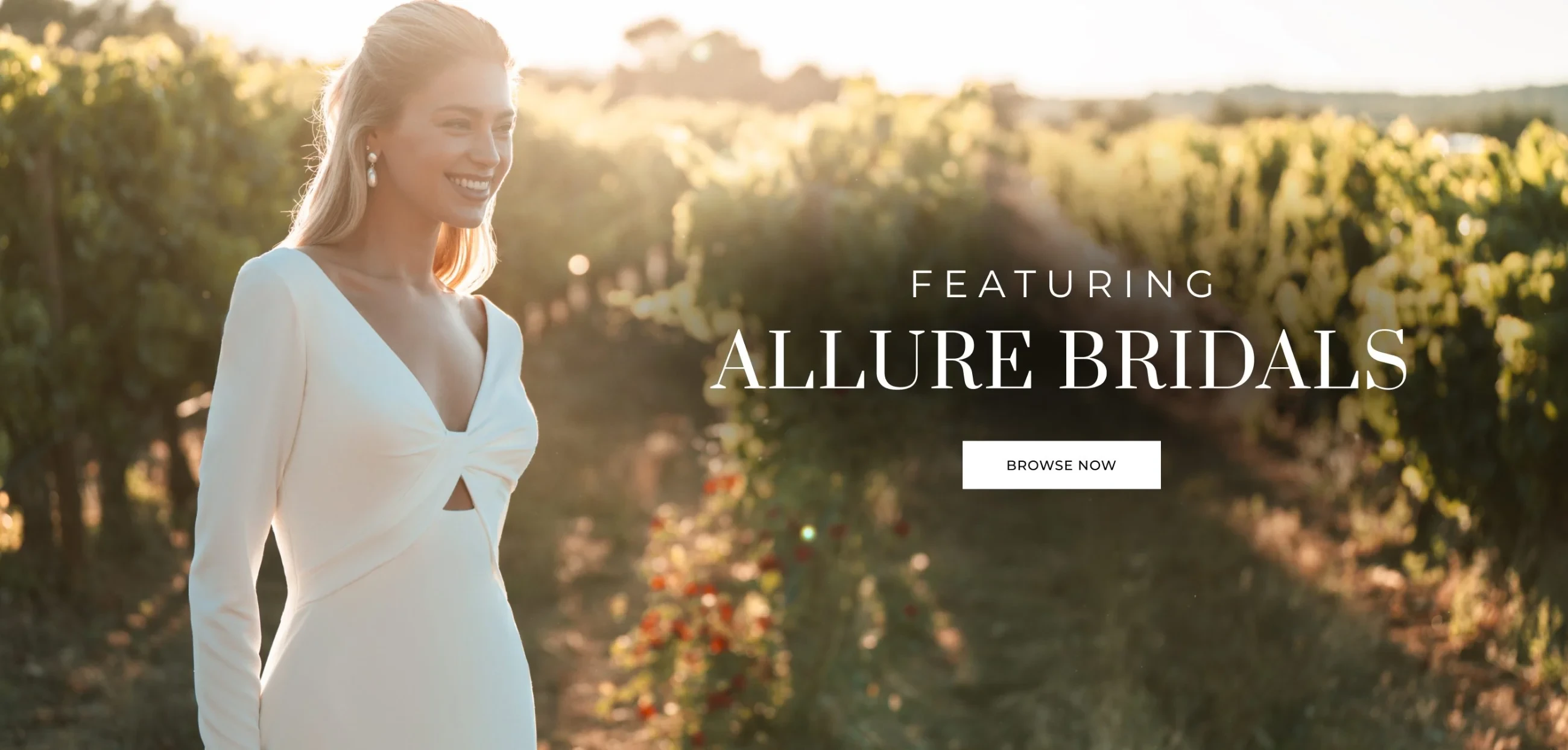 Model wearing Allure Bridals gowns, desktop banner