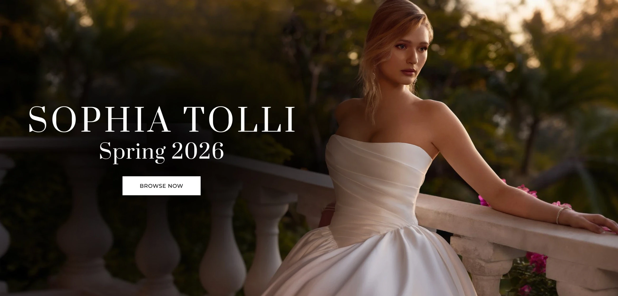 Model wearing Sophia Tolli Spring 2026 wedding gowns, desktop banner